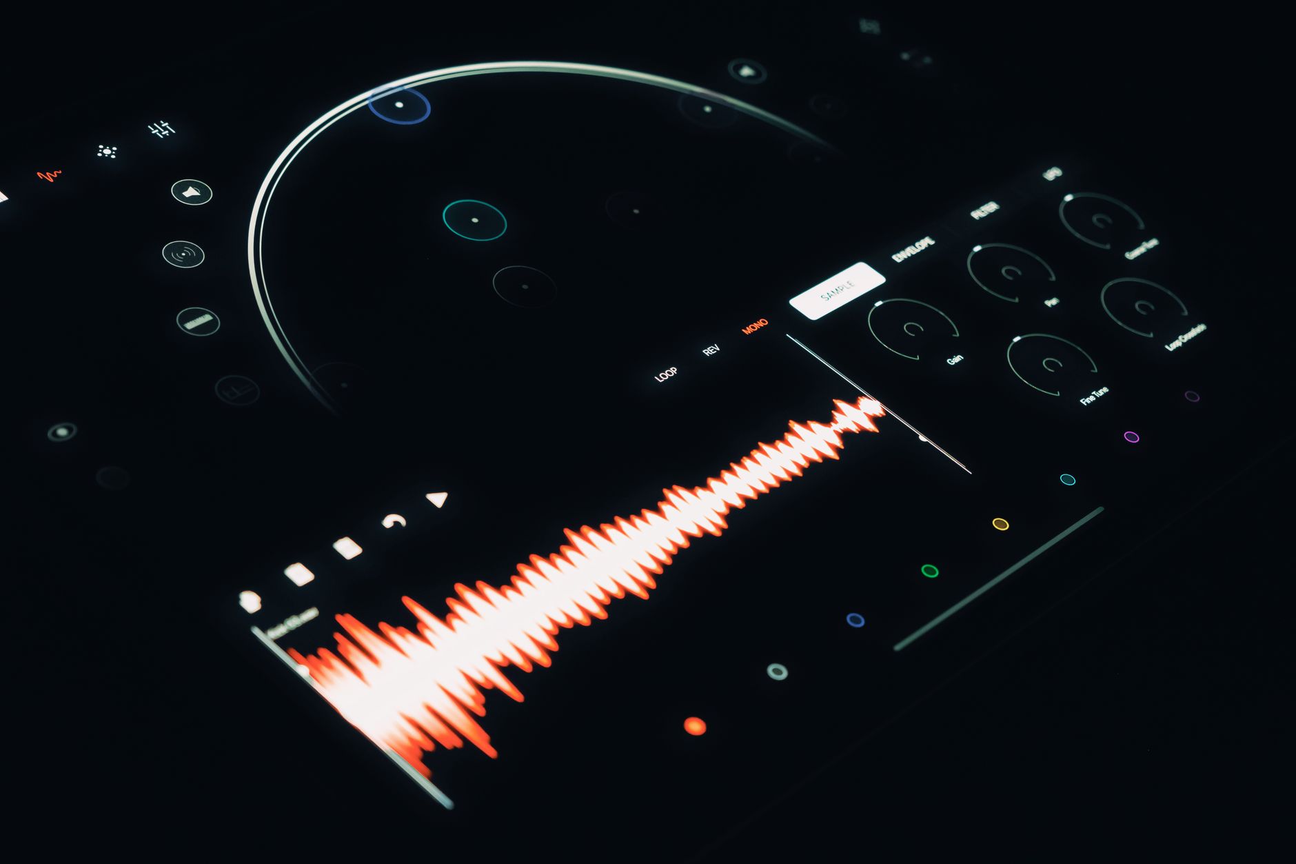 Close-up of a digital audio interface displaying a vibrant sound wave and control elements.