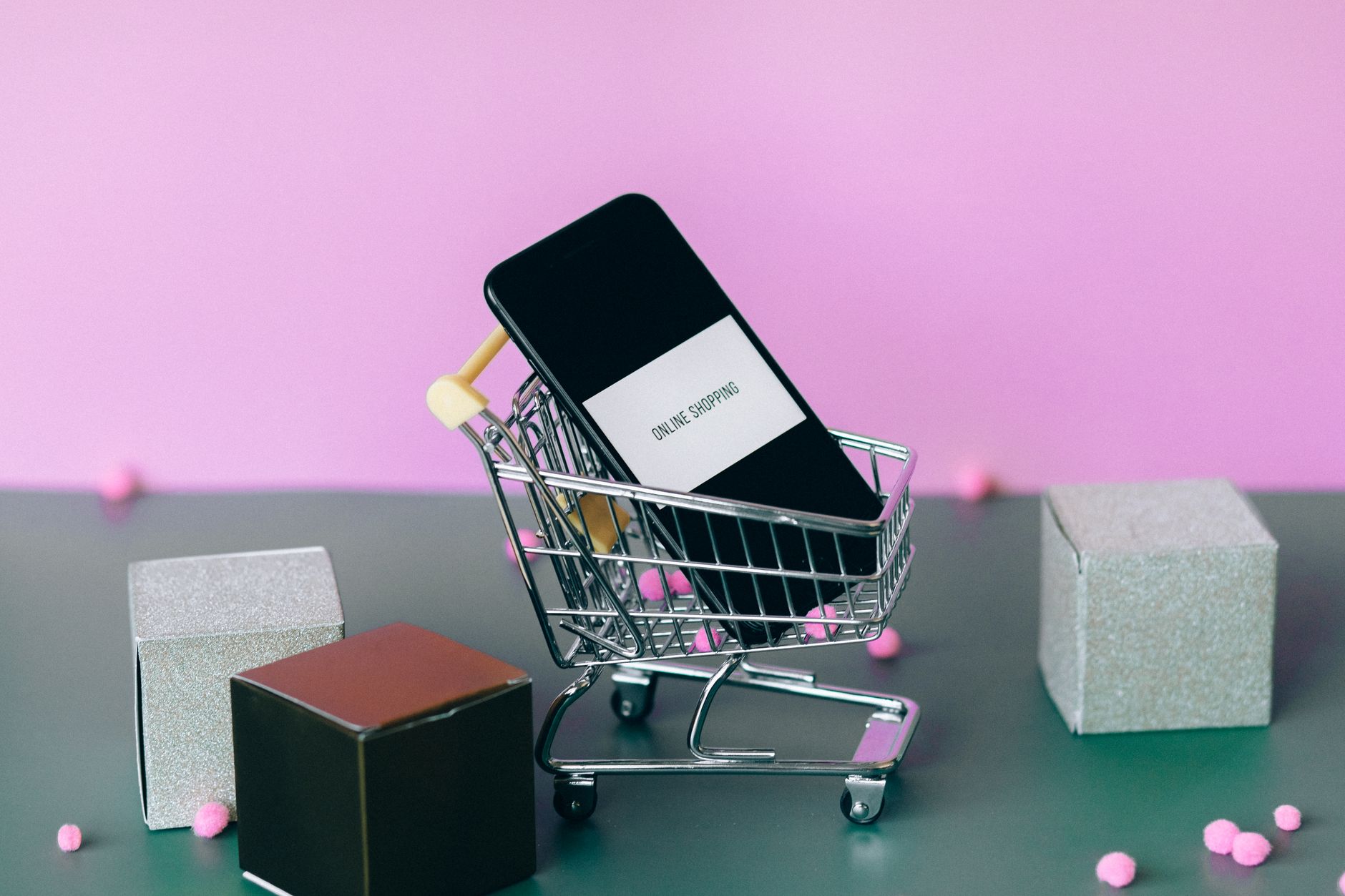 Smartphone showing an online shopping cart representing D2C ecommerce in India