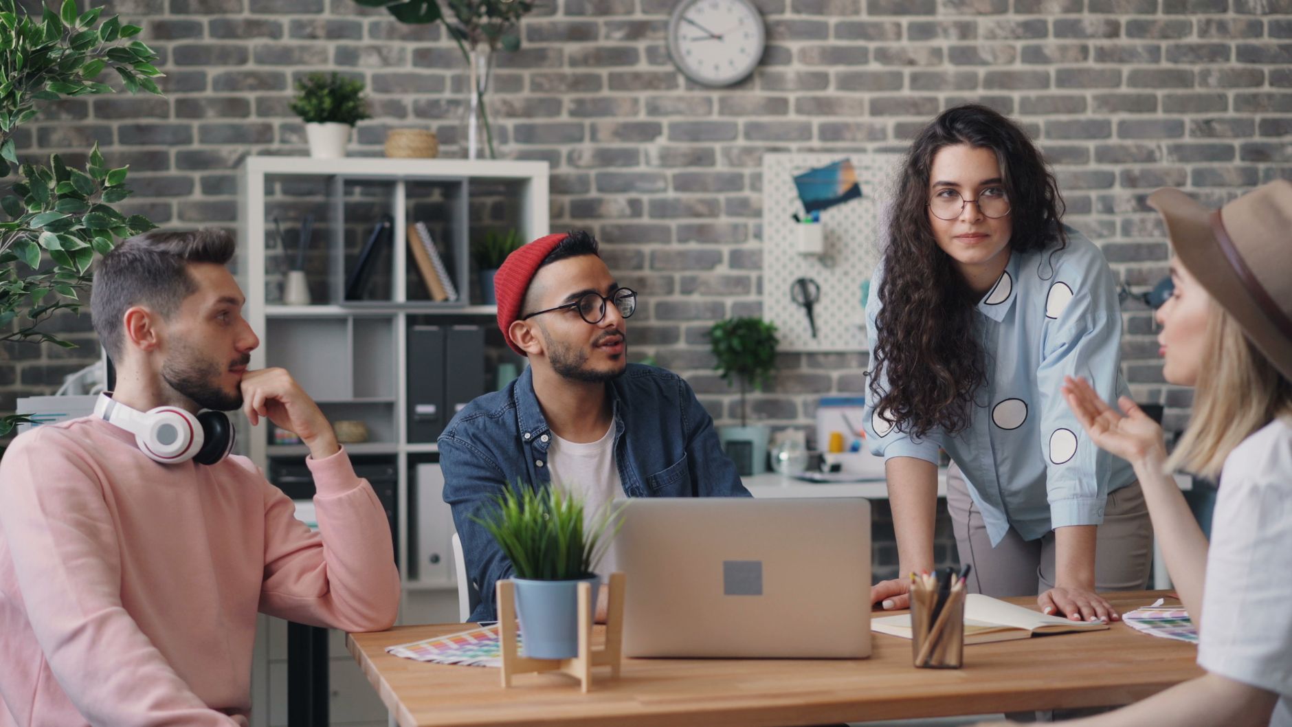 Young professionals collaborating in a stylish office environment.