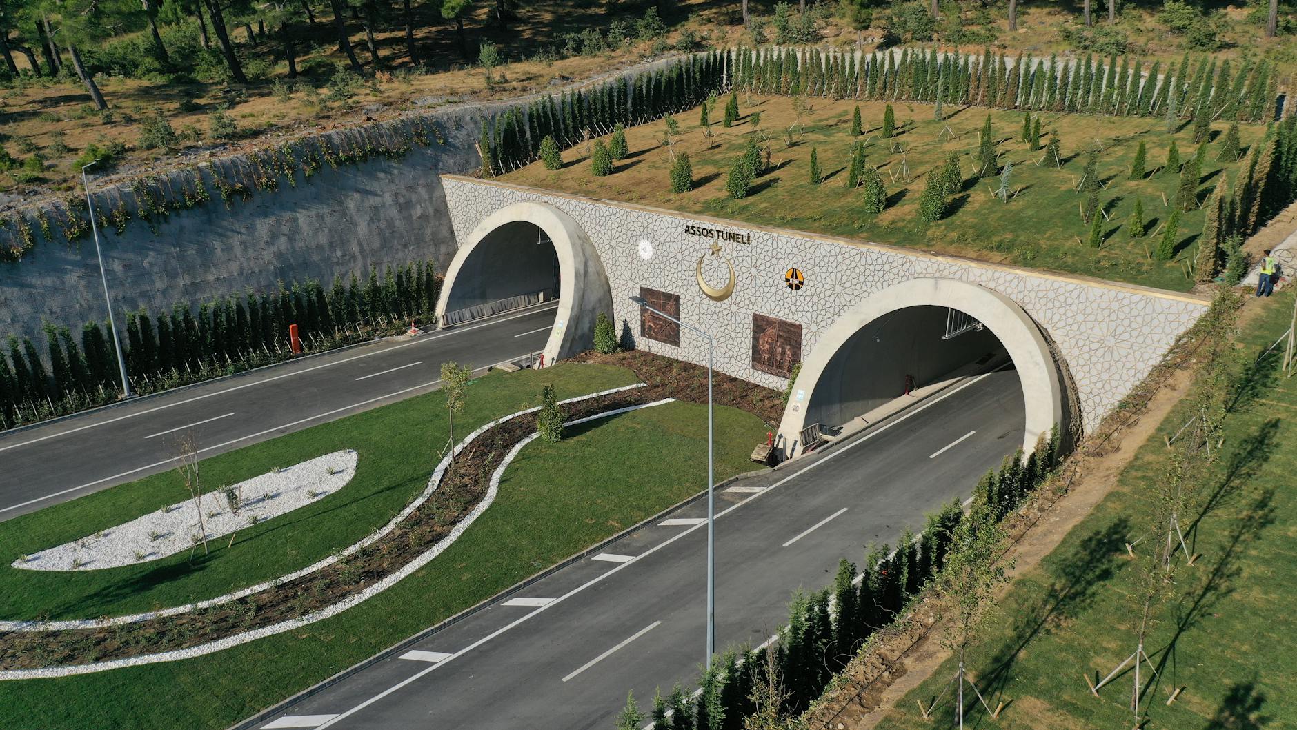 Drone photo of Assos Tunnel with landscaped greenery in Çanakkale, Turkey.