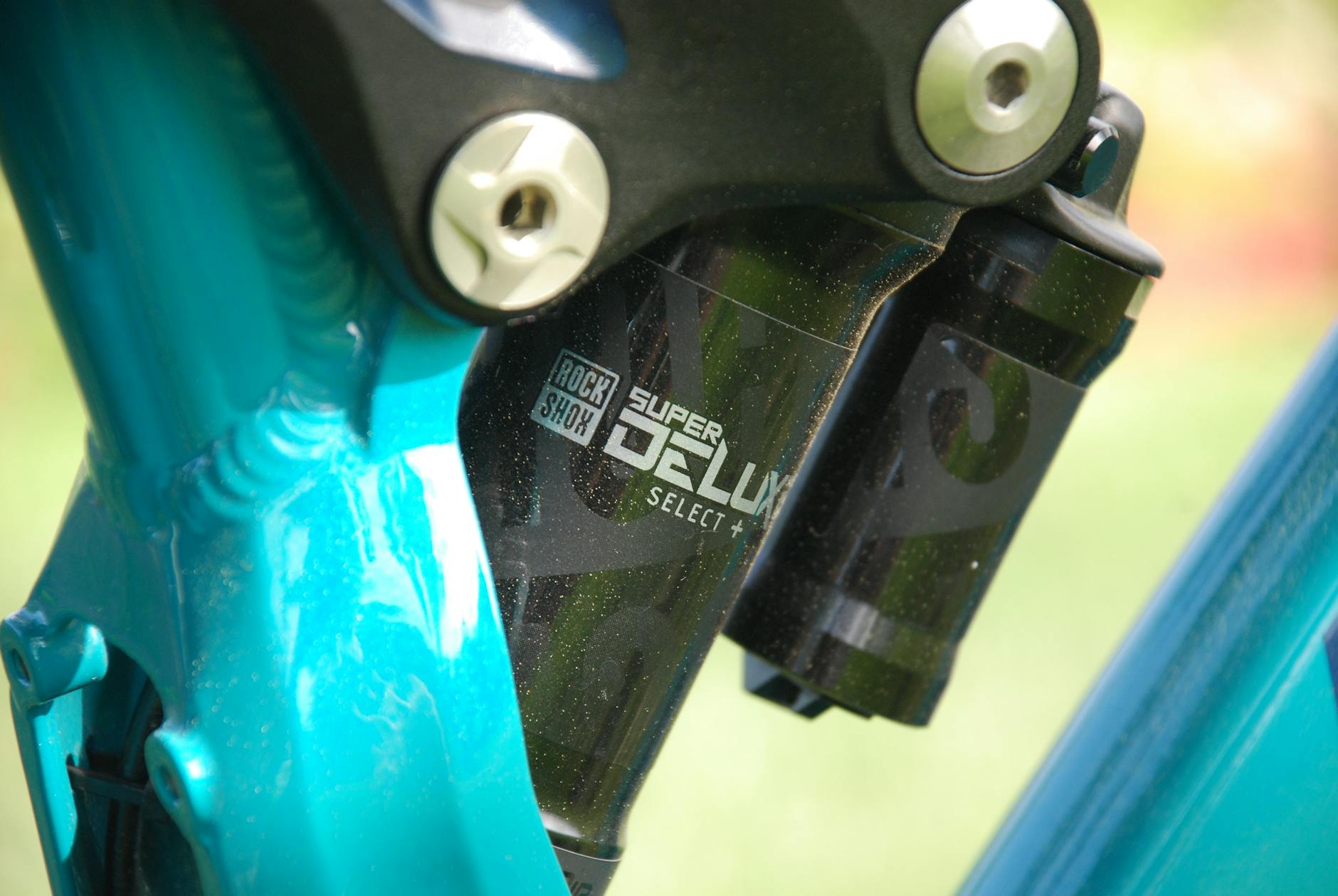Detailed view of a bicycle shock absorber, showcasing mechanics and design.