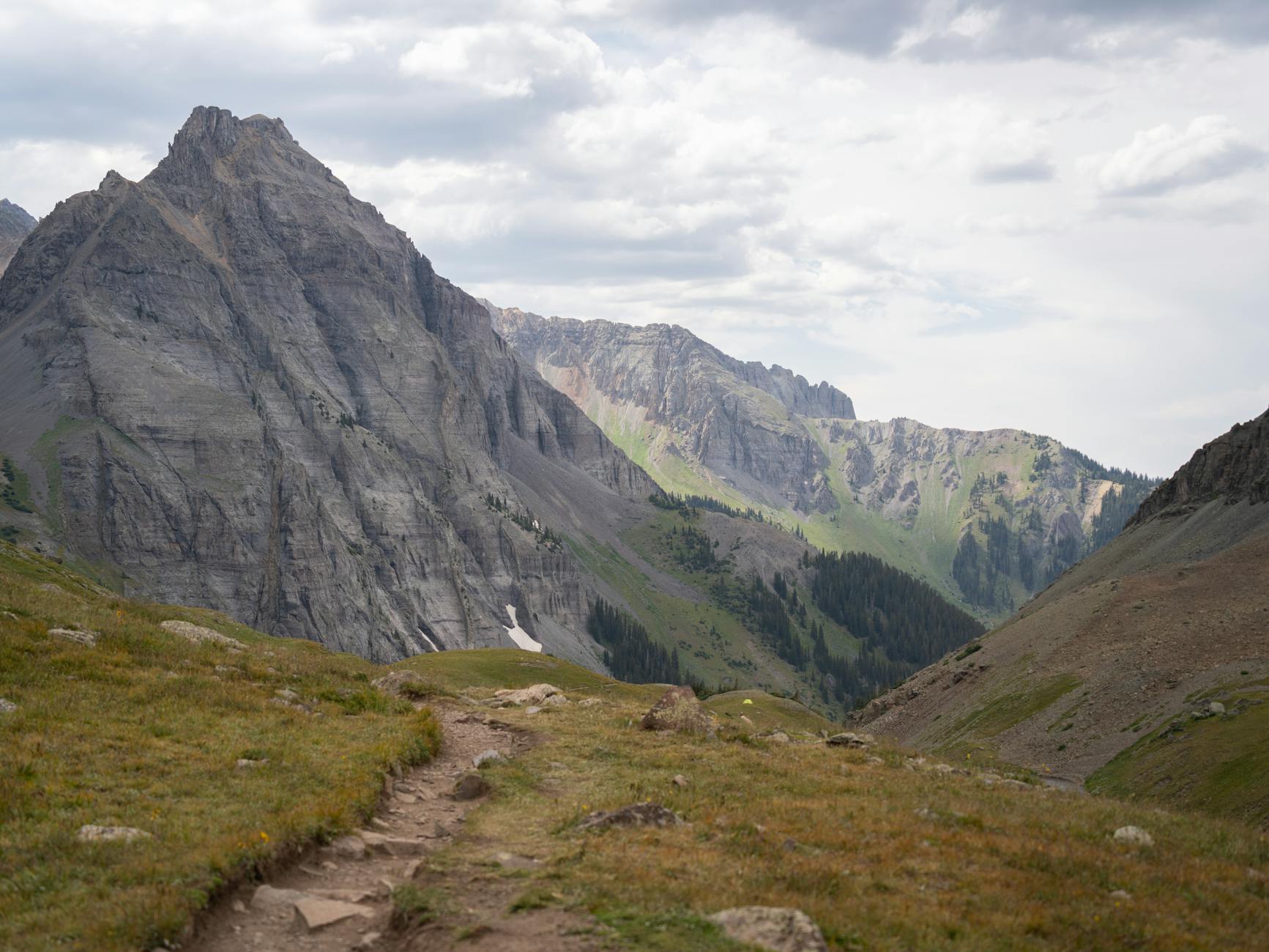 Explore the rugged beauty of the San Juan Range with this scenic mountain trail ideal for hiking and adventure.