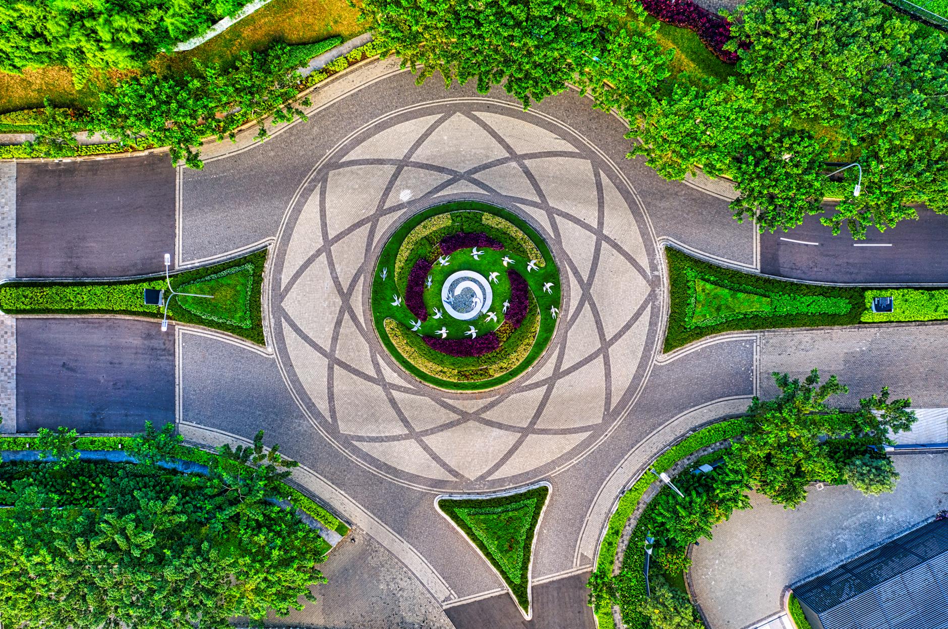 Stunning aerial view of a geometric roundabout surrounded by greenery in Banten, Indonesia.