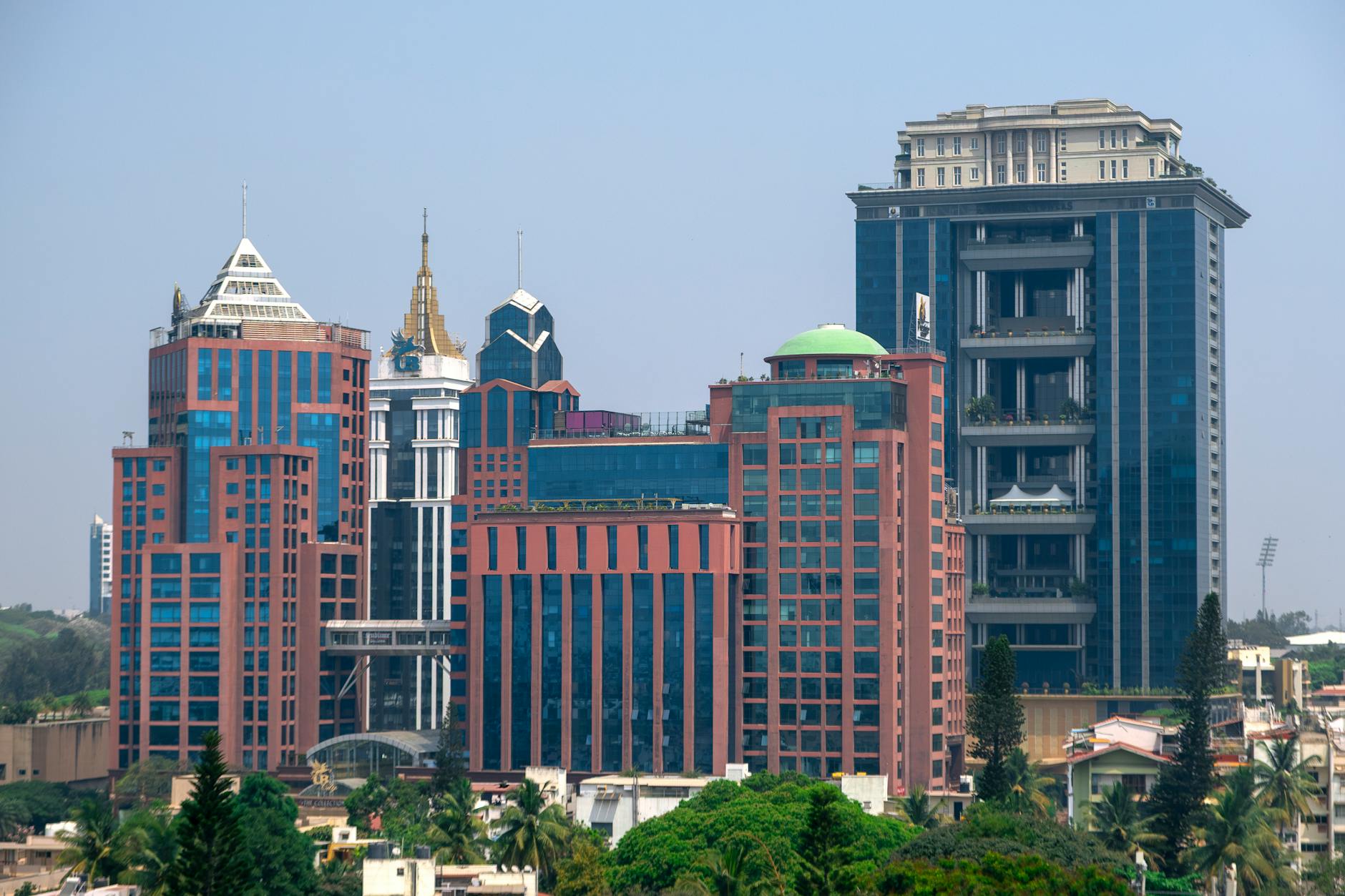 Stunning view of modern skyscrapers in Bengaluru, showcasing vibrant architecture on a sunny day.