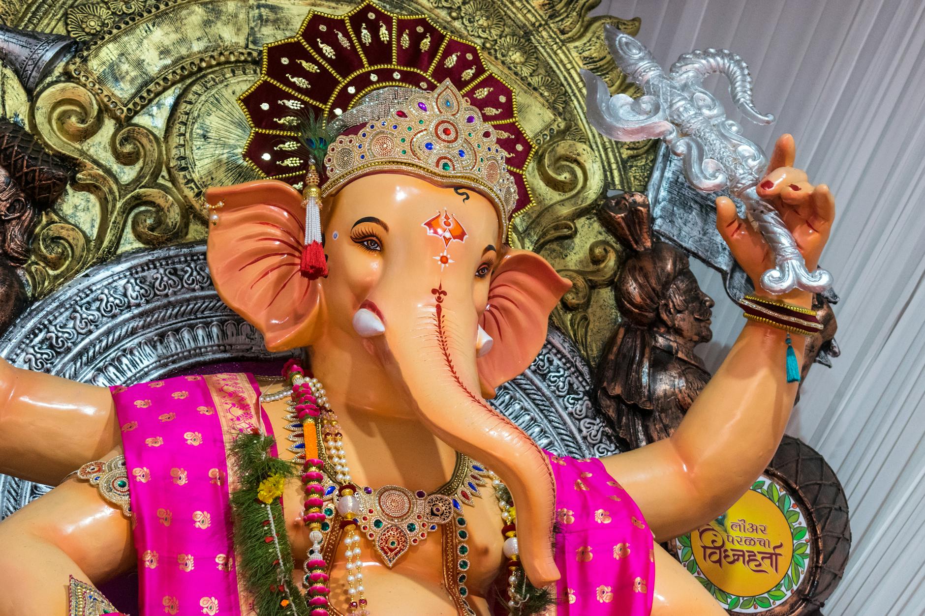 Colorful Ganesh idol during Ganesh Chaturthi festival in Mumbai, showcasing traditional Hindu artistry and worship.