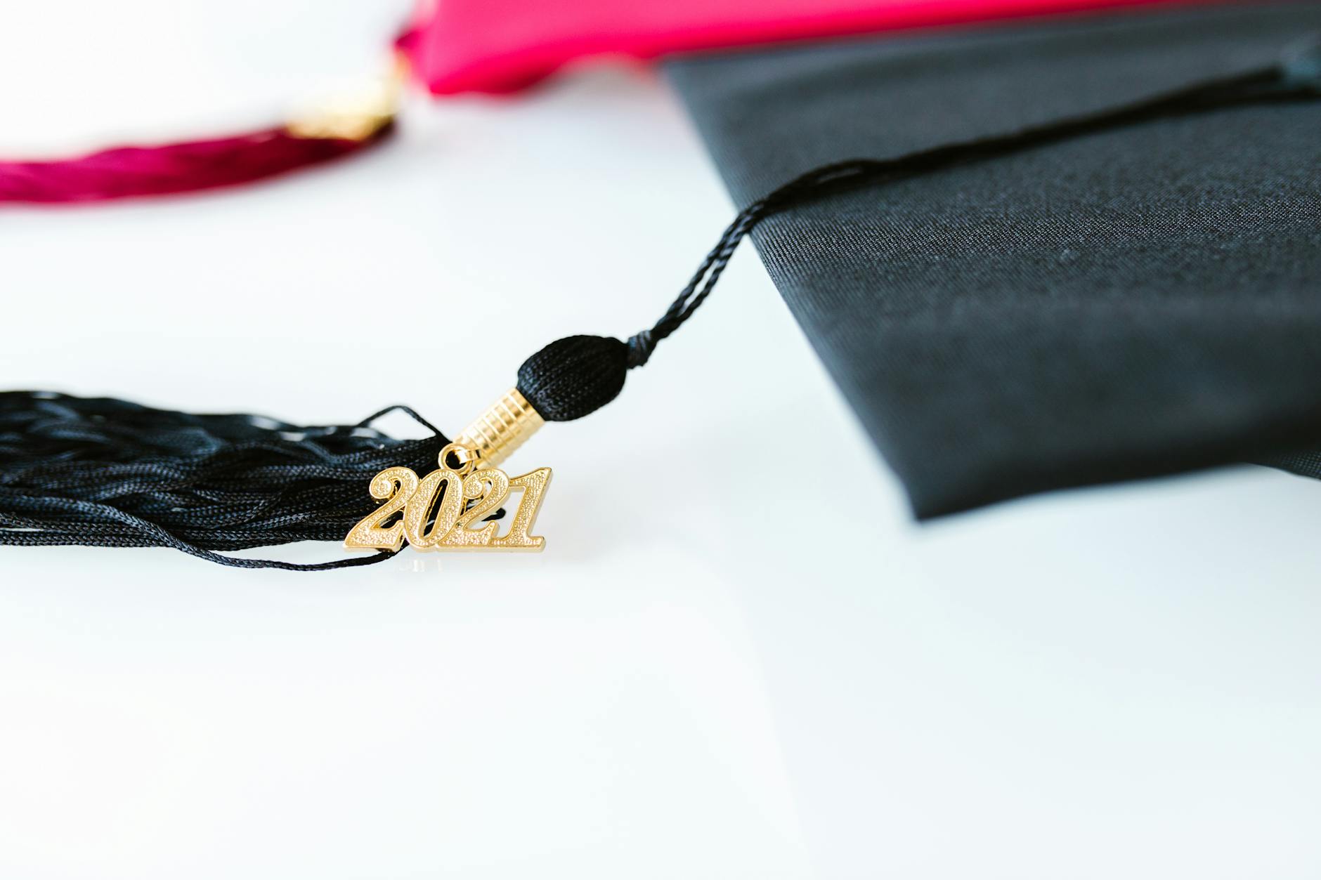 Close-up of a graduation cap with a 2021 tassel, symbolizing academic achievement.